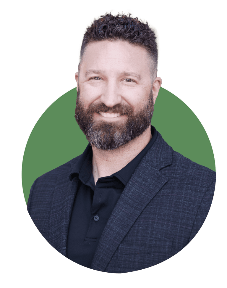 Headshot photo of Chris Brien CEO of Brien Contracting. He is wearing a sport coat and has a beard.