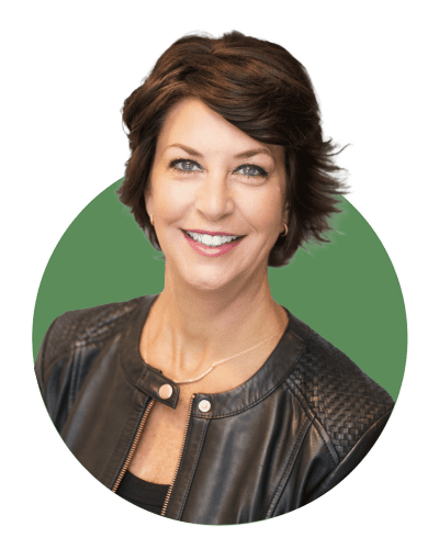 Headshot of Stephanie Trenter VP of Strategic Growth at Brien Contratcing. She is wearing a black leather jacket and has short brown hair.